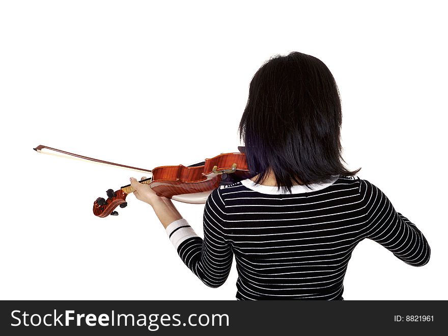 Picture of a female brunette violin player from behind. Picture of a female brunette violin player from behind