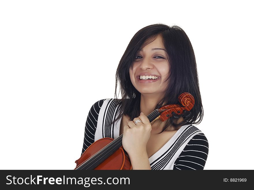 Youn Indian woman with violin in her hands isolated over white. Youn Indian woman with violin in her hands isolated over white
