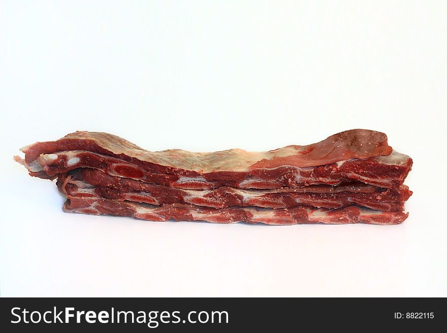 Raw beef on white background. Raw beef on white background