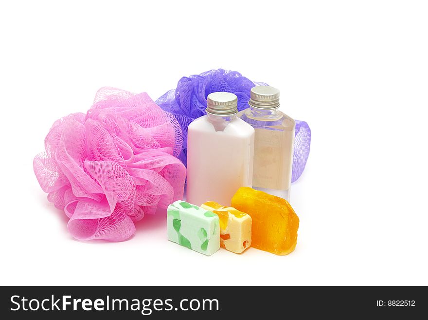Natural soap and basts on white background