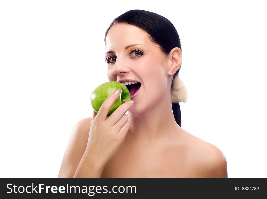 Young woman eating apple and smile over white background