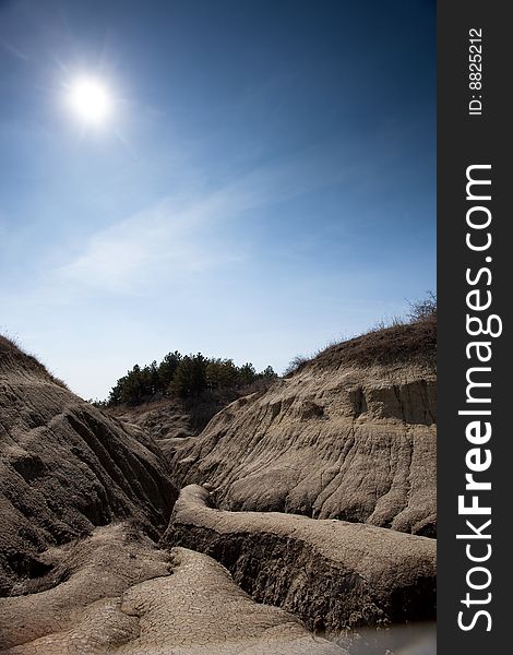 Strange landscape (dry mud, scorched earth) produced bu active mud volcanoes. Location: Romania, Buzau county. Strange landscape (dry mud, scorched earth) produced bu active mud volcanoes. Location: Romania, Buzau county.