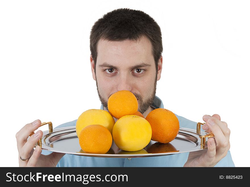 Man With A Plate Full Of Tropical Fruit