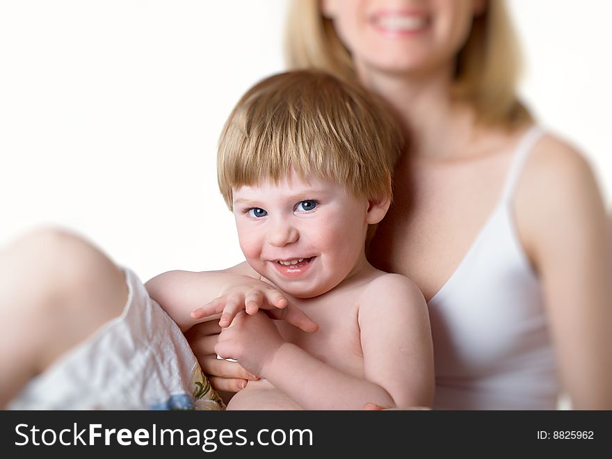 The little boy with mum on the isolated. The little boy with mum on the isolated