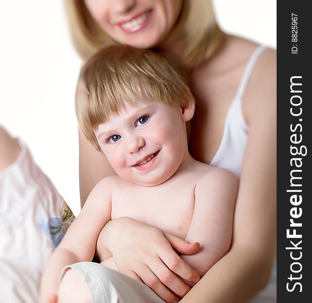 The little boy with mum on the isolated. The little boy with mum on the isolated