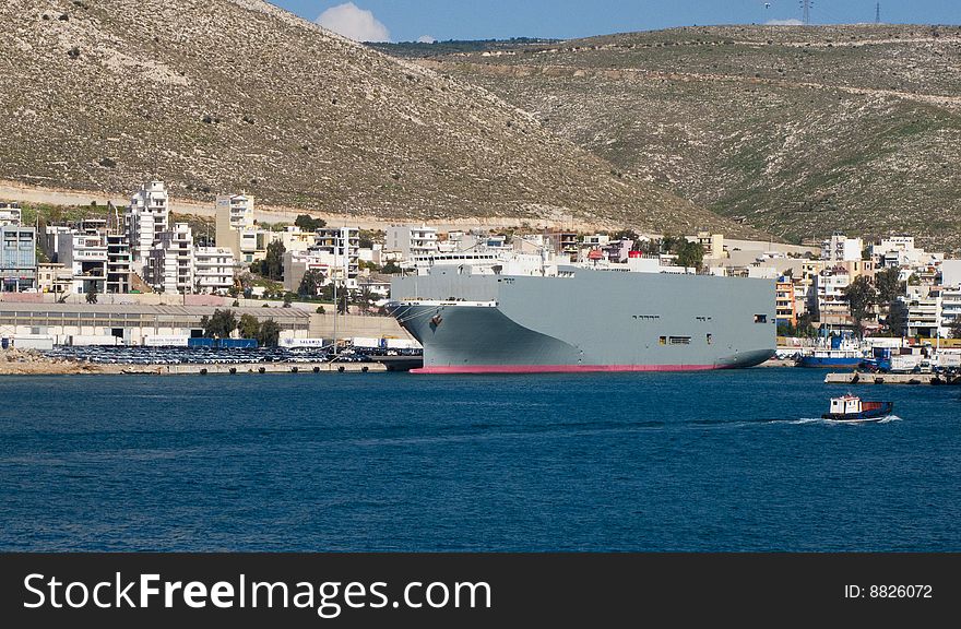 A ship in the harbour of pireaus waiting for the cargo. A ship in the harbour of pireaus waiting for the cargo