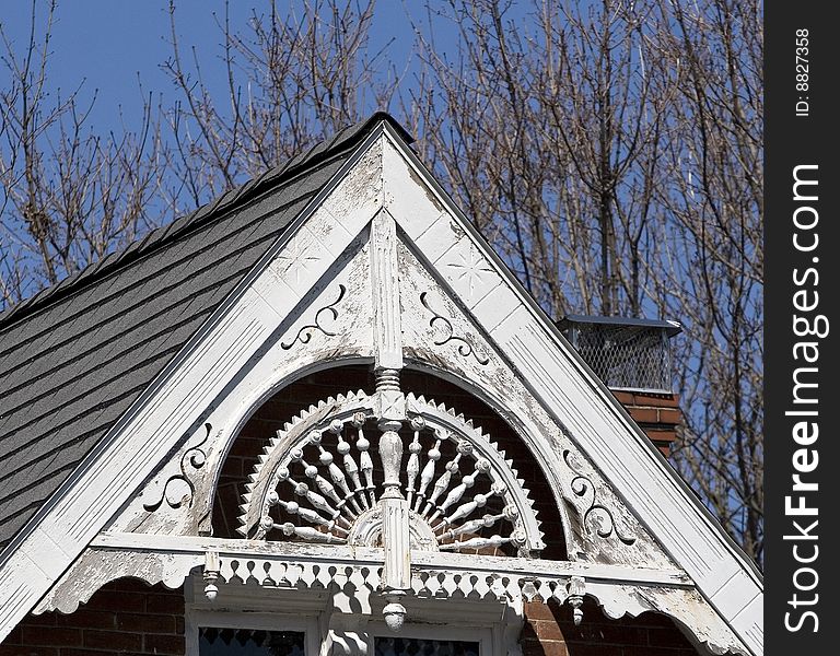 Showing the ornate wood work on an old house in Pennsylvania, in need of repair. Showing the ornate wood work on an old house in Pennsylvania, in need of repair.
