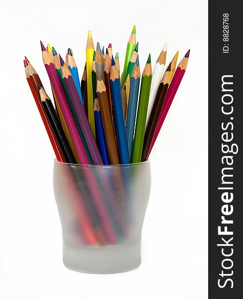 Assorted Colored Pencils in Glass