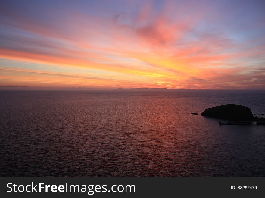 Peach Sky At Sunset Over Ocean