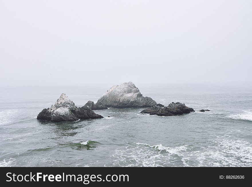 Rock Outcrops In Stormy Ocean