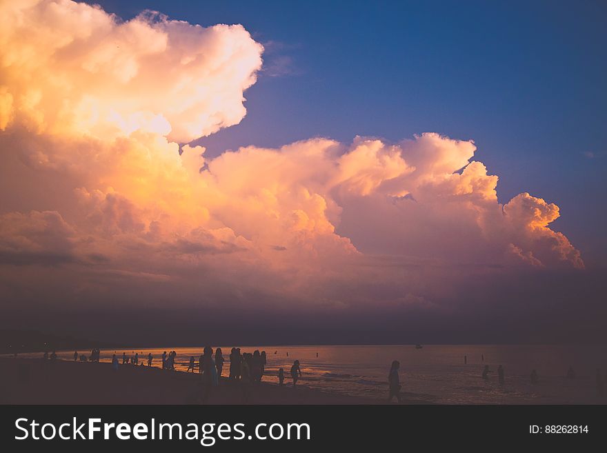 Clouds At Sunset Over Beach