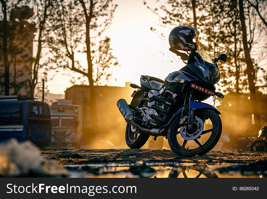 Motorbike parked with helmet