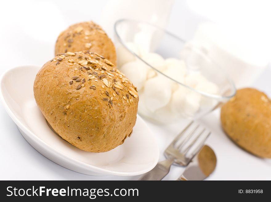 Bread and mozzarella closeup on white