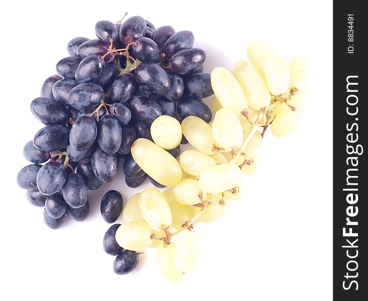 Black and green ripe grape isolated on white