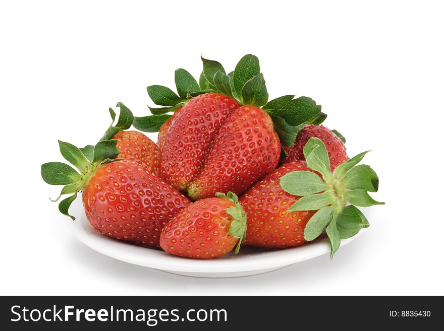 Heap of the fresh strawberry on a plate. Heap of the fresh strawberry on a plate.