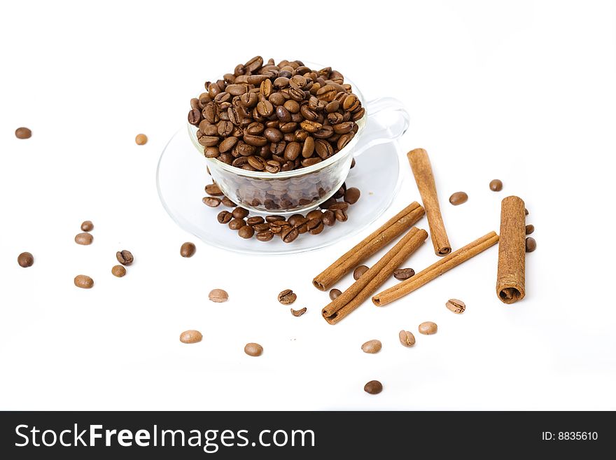 Coffee cup and grain on white background. Coffee cup and grain on white background