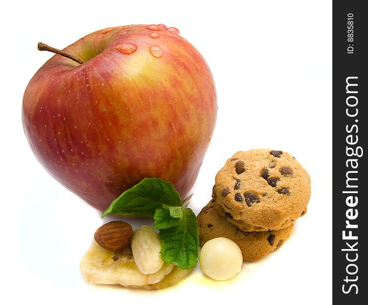 Fresh ripe apple with mint and cookies. Fresh ripe apple with mint and cookies