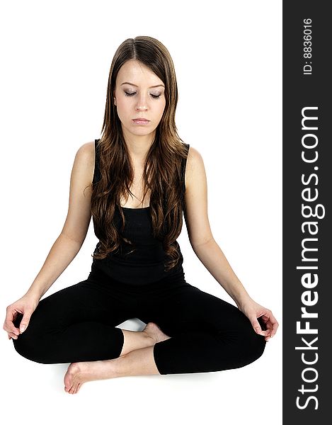 Young woman is doing an expert yoga exercise