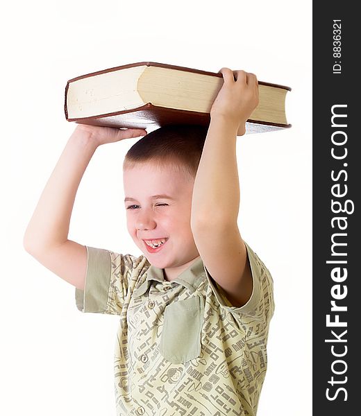 The child with book on the white