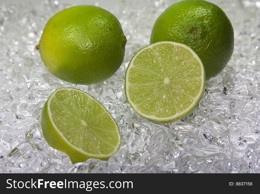 Cold fresh green limette on ice. Cold fresh green limette on ice