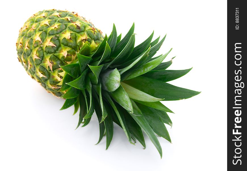 Ripe pineapple isolated on white.