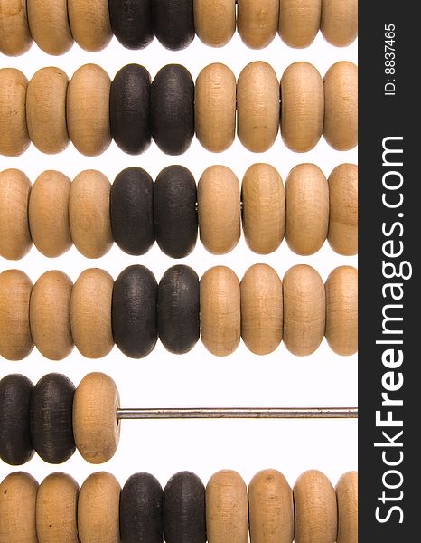 Obsolete wooden abacus, white background