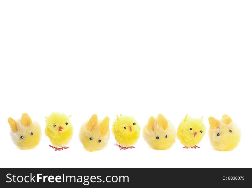 Easter chicks and bunny closeup over white background. Easter chicks and bunny closeup over white background