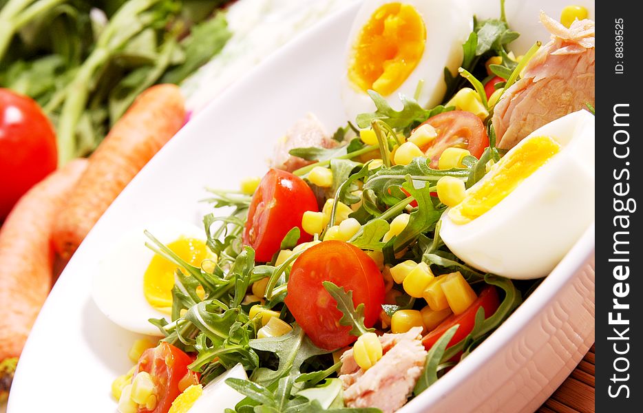 Eggs tomatoes rocket and tuna salad. Eggs tomatoes rocket and tuna salad