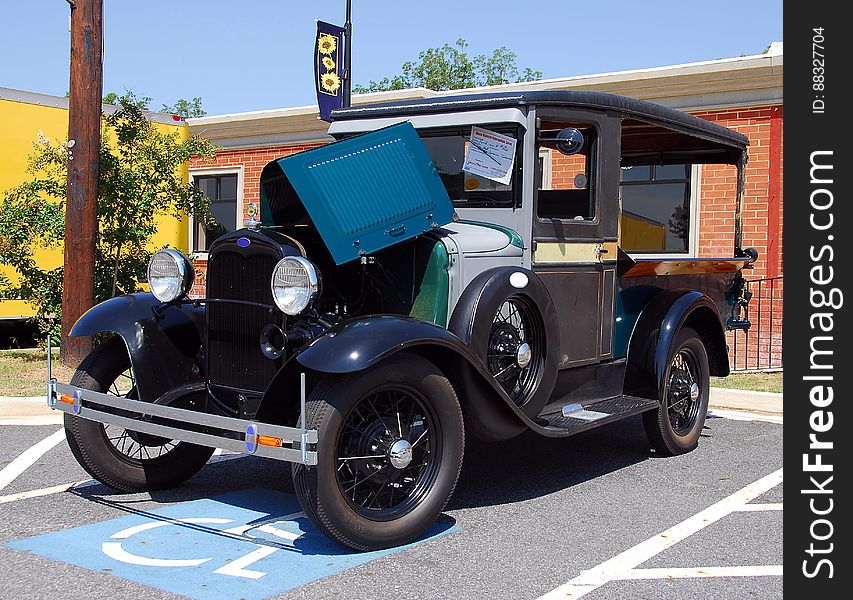Vintage Auto In Handicapped Parking Space