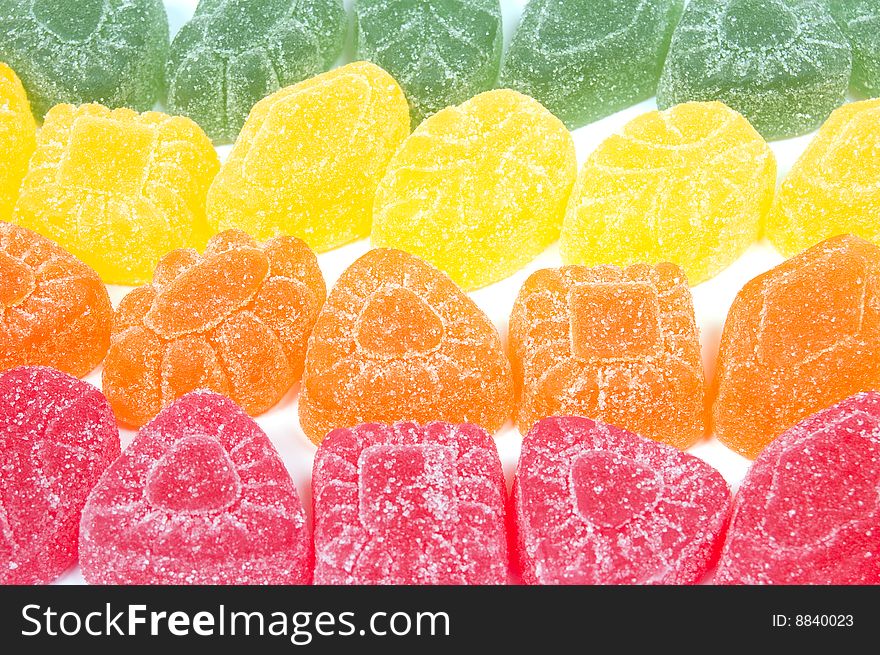Multicoloured sweet gumdrops, food background. Multicoloured sweet gumdrops, food background