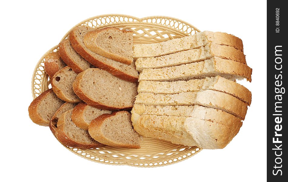 White and grey bread in a basket are isolated on a white background