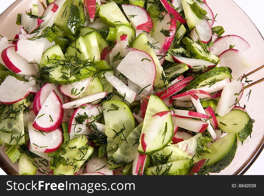 Salad from a fresh radish, cucumbers and fennel. Salad from a fresh radish, cucumbers and fennel