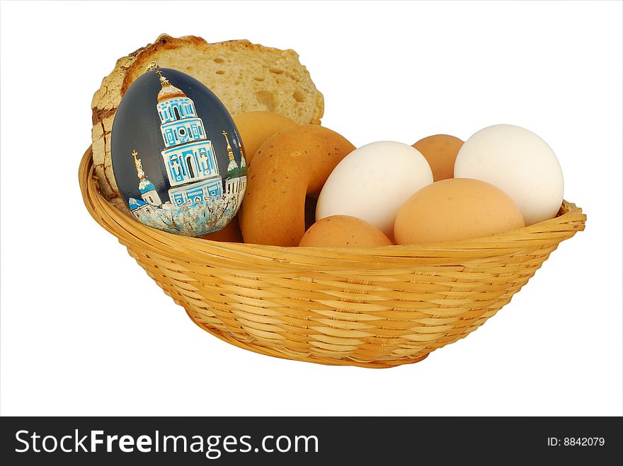 Crib with a easter eggs and bread. Crib with a easter eggs and bread