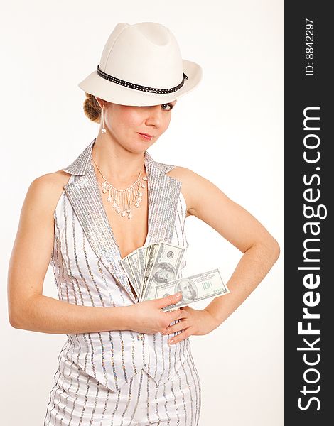 Young pretty woman in white hat and striped suit with money in hand