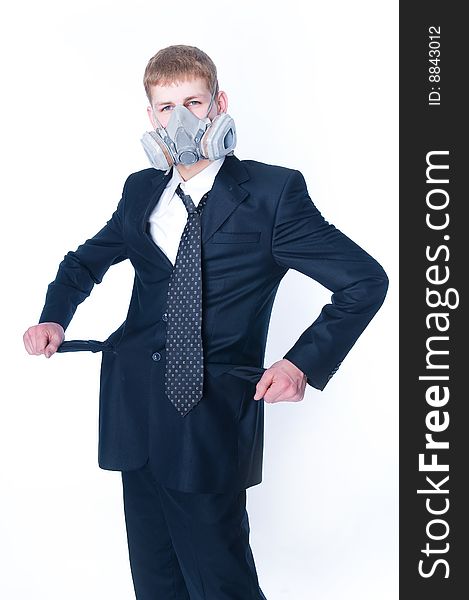 Crazy businessman with empty pockets, wearing gasmask, isolated on white background