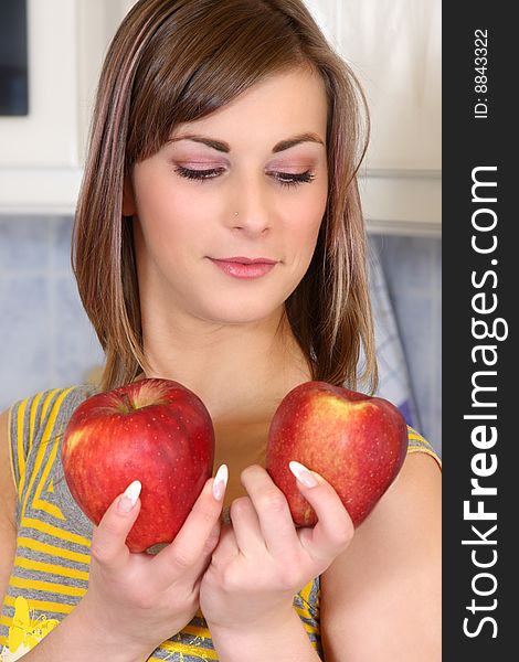 Young Woman In Her Kitchen