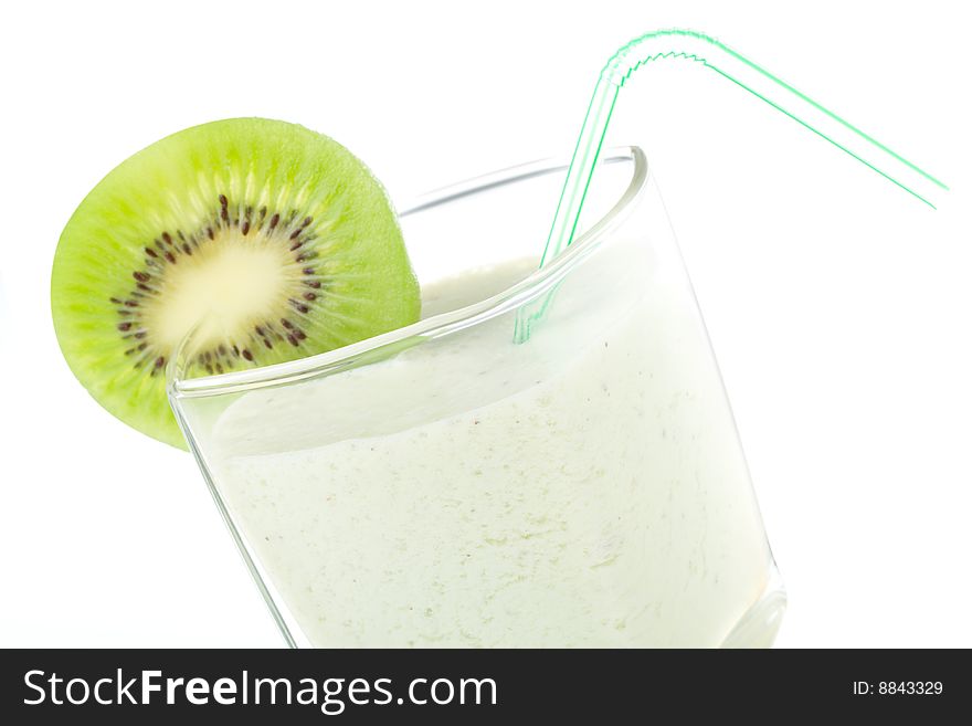 Close-up milkshake with kiwi and straw, isolated on white