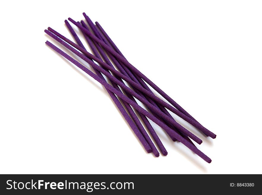 Violet lavender joss sticks isolated on a white background. Violet lavender joss sticks isolated on a white background