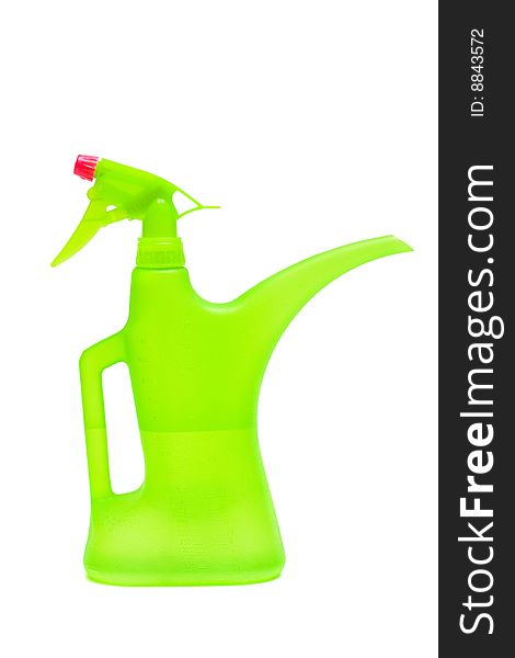 Green watering can on a white background