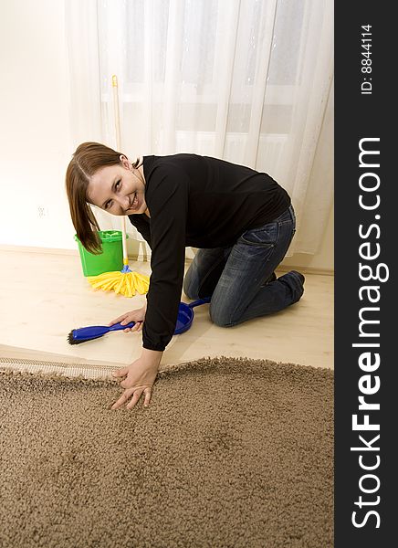 Woman cleaning house in gloves. Woman cleaning house in gloves