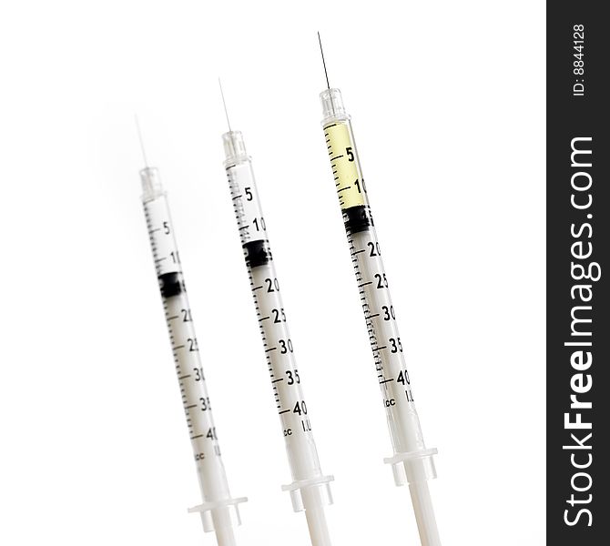 Three Syringes Isolated On White