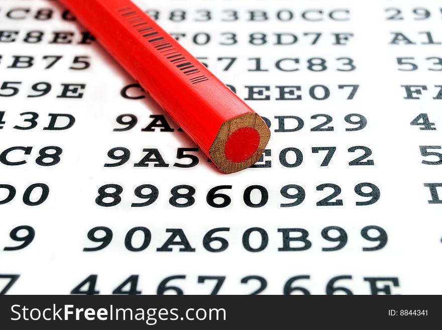 A Red Pencil And Encrypted Data Sheet