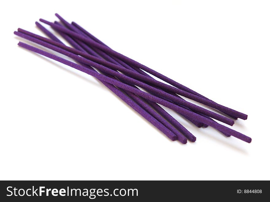 Violet lavender joss sticks isolated on a white background. Violet lavender joss sticks isolated on a white background