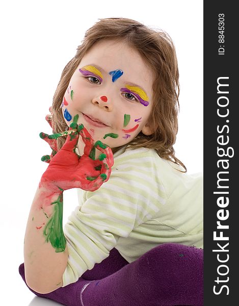 The gifted young artist. Close-up portrait of fanny girl with painted hands and face, isolated on white. The gifted young artist. Close-up portrait of fanny girl with painted hands and face, isolated on white