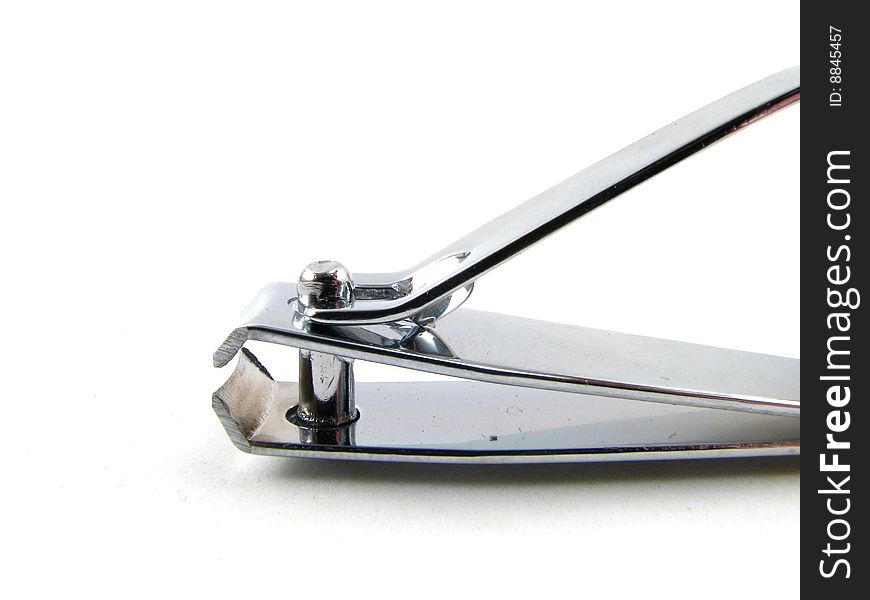 Metal nail clippers on a white background