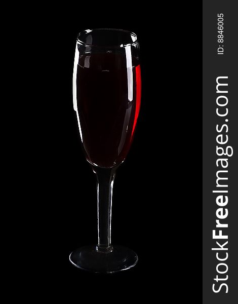 Wine glass isolated at black background