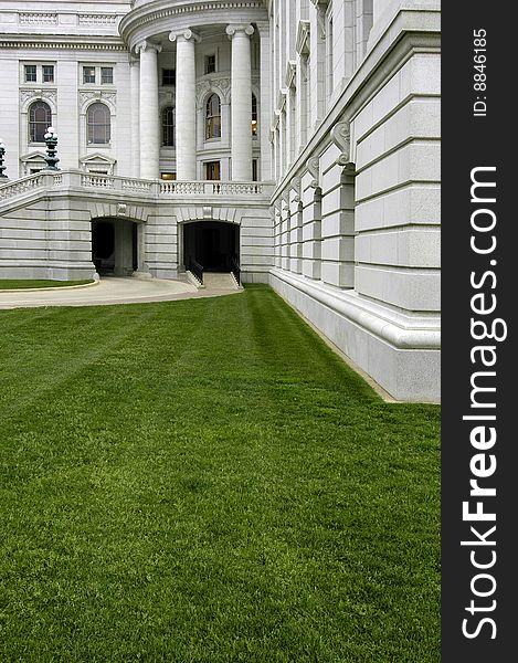 Columns of an old building, architecture and grass lawn. Columns of an old building, architecture and grass lawn