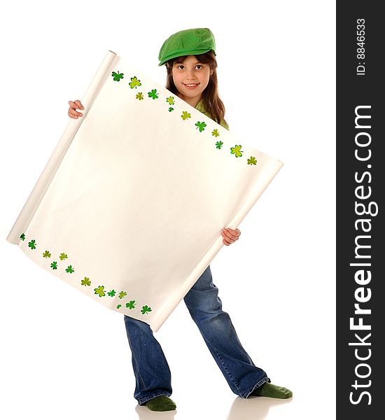 A cute elementary girl holding a blank sign with a sharmrock border for your St. Patrick's Day message. Isolated on white. A cute elementary girl holding a blank sign with a sharmrock border for your St. Patrick's Day message. Isolated on white.