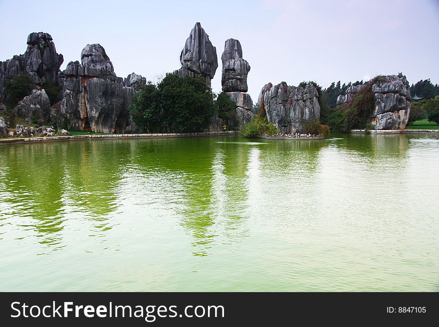 Stone forest around the river scene