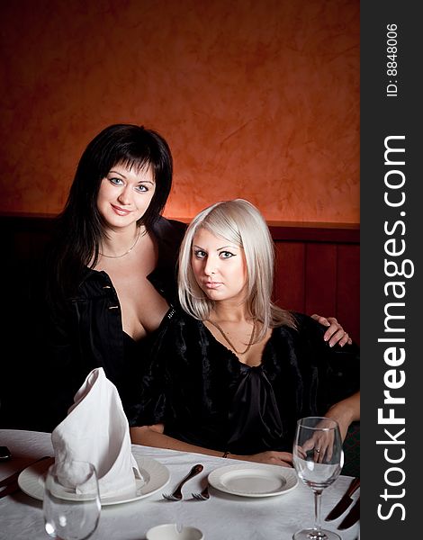 Two Young Women At A Restaurant